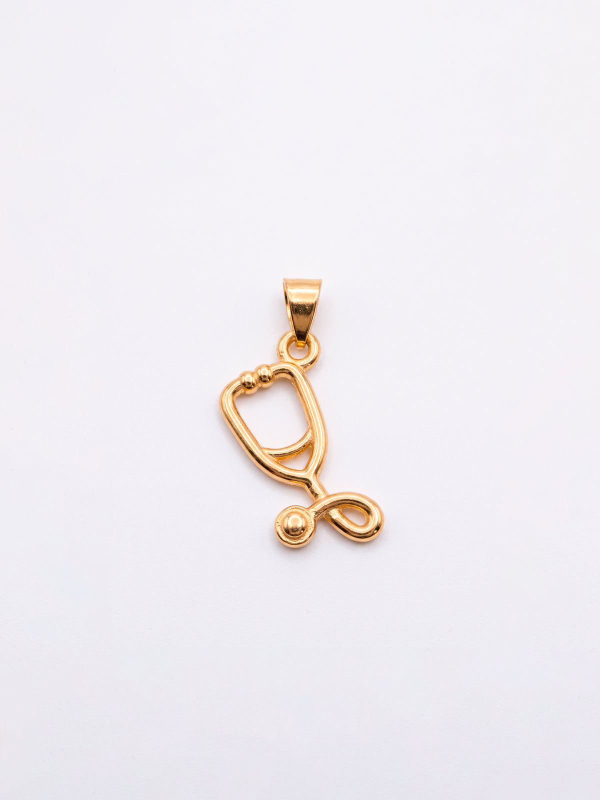 Pingente medicina estetoscópio 1,7 x 1,0 cm - banhado a ouro 18k
