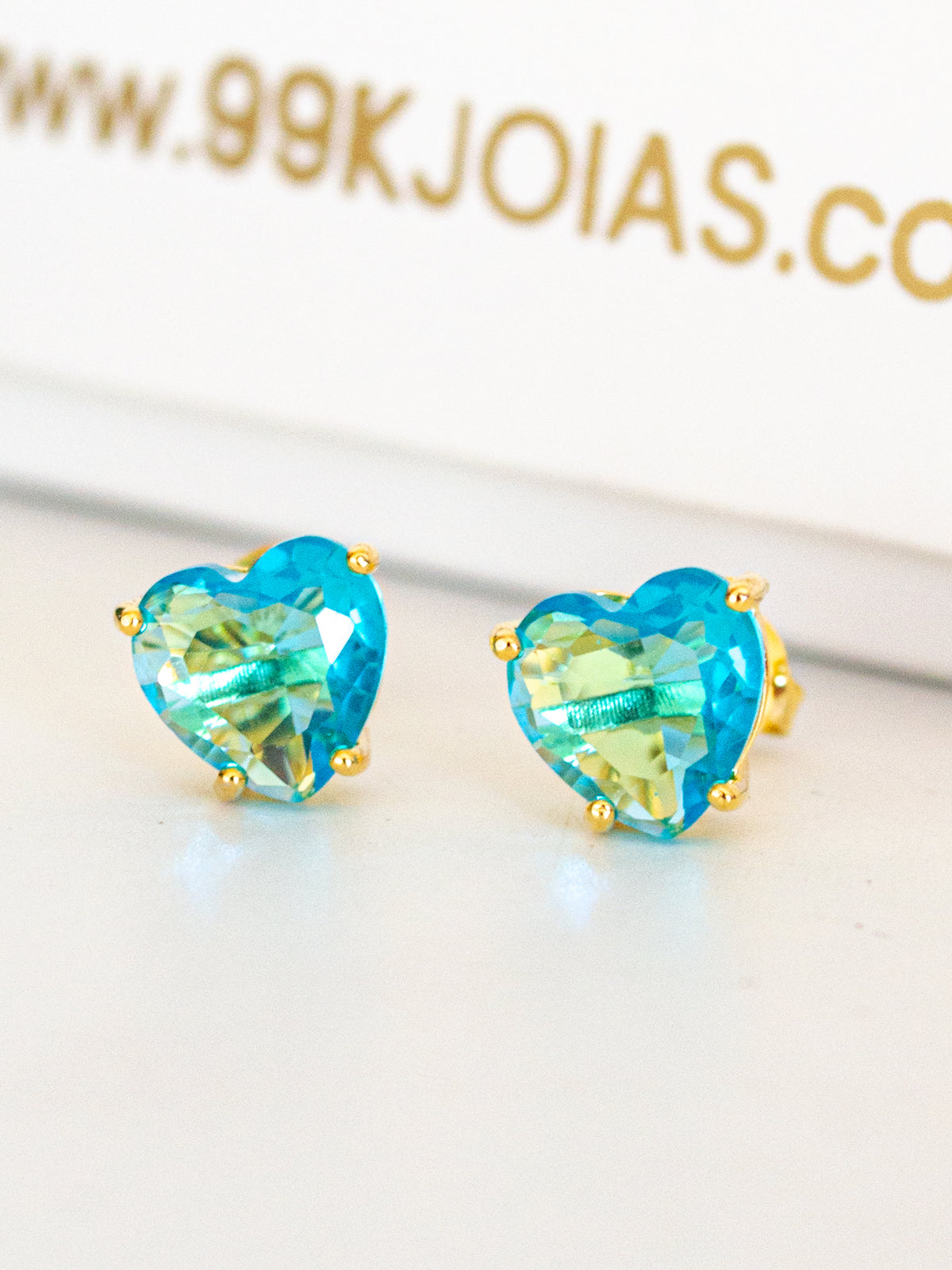 Brinco Coração Pedra Azul - banhado a ouro 18k
