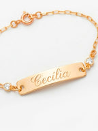 Pulseira Infantil com plaquinha e coração - banhada a ouro 18k